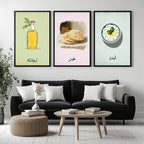 Set of 3 framed canvas triptych featuring illustrated olive oil bottle, flatbread and labneh bowl with Arabic calligraphy labels on soft green, pink and blue pastel backgrounds, displayed above a neutral sofa.