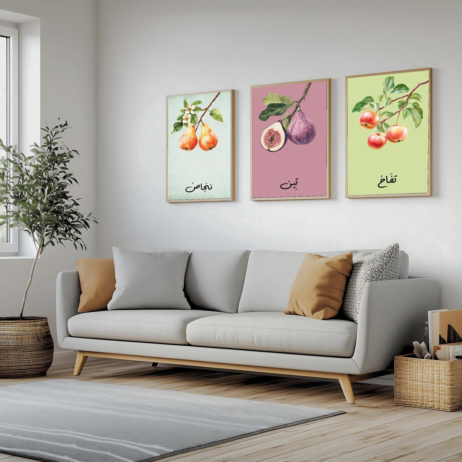 Set of 3 framed canvas triptych featuring soft watercolor botanical illustrations of pear, fig and apple branches with Arabic calligraphy labels on pastel mint, pink and green backgrounds, displayed above a neutral sofa.