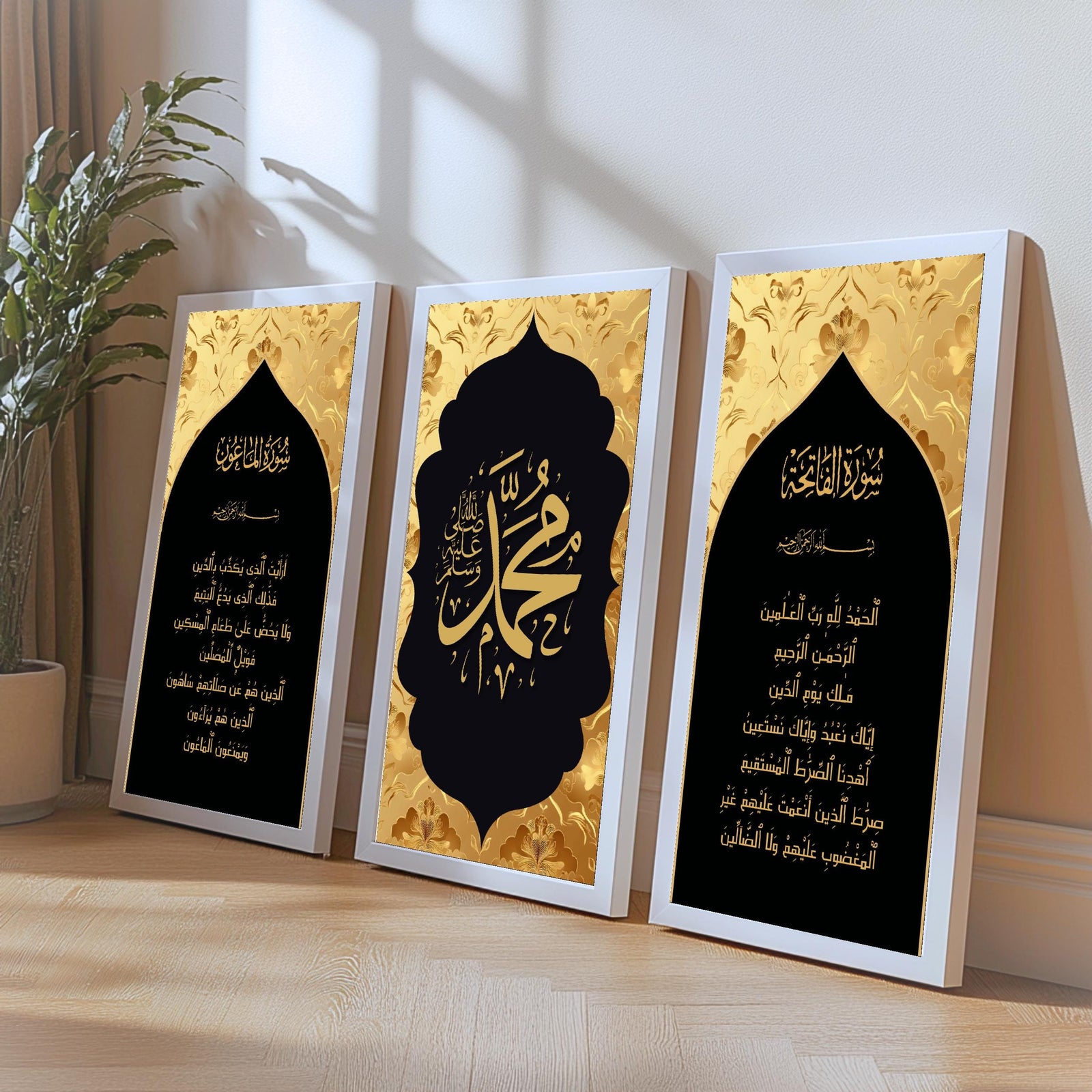 Set of 3 framed canvas triptych featuring Surah Al-Maoun, Muhammad in Arabic calligraphy and Surah Al-Fatiha in gold on dramatic black arch panels with gold textured background, displayed above a neutral sofa.