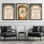 Set of 3 framed canvas triptych with Surah Al-Rahman, large Bismillah calligraphy and Surah Al-Fatiha inside vibrant green and pink Mughal floral arches on a warm cream background, displayed above a neutral sofa.
