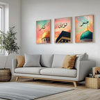 Set of 3 framed canvas triptych with Shukr, Tawakkul and Sabr in Arabic calligraphy above close-up mosque domes against a dreamy coral and teal sunset sky, displayed above a neutral sofa in a modern living room.
