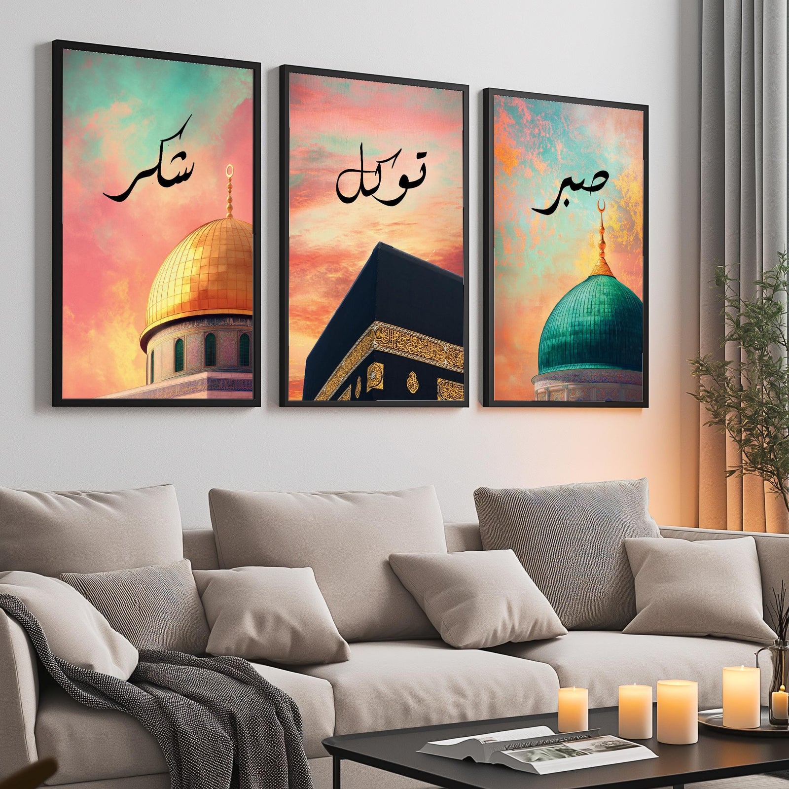Set of 3 framed canvas triptych with Shukr, Tawakkul and Sabr in Arabic calligraphy above close-up mosque domes against a dreamy coral and teal sunset sky, displayed above a neutral sofa in a modern living room.