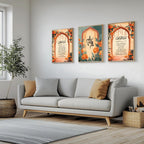 Set of 3 framed canvas triptych with Surah Al-Rahman, Bismillah and Surah Al-Fatiha in Arabic calligraphy inside terracotta arches with orange marigold flowers and teal accents, displayed above a neutral sofa.