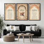 Set of 3 framed canvas triptych featuring Surah Al-Rahman, Al-Quran Al-Kareem and Surah Al-Fatiha in Arabic calligraphy inside floral pink and gold Islamic arches on a warm cream background, displayed above a neutral sofa.