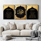 Set of 3 framed canvas triptych featuring Surah Al-Maoun, Muhammad in Arabic calligraphy and Surah Al-Fatiha in gold on dramatic black arch panels with gold textured background, displayed above a neutral sofa.