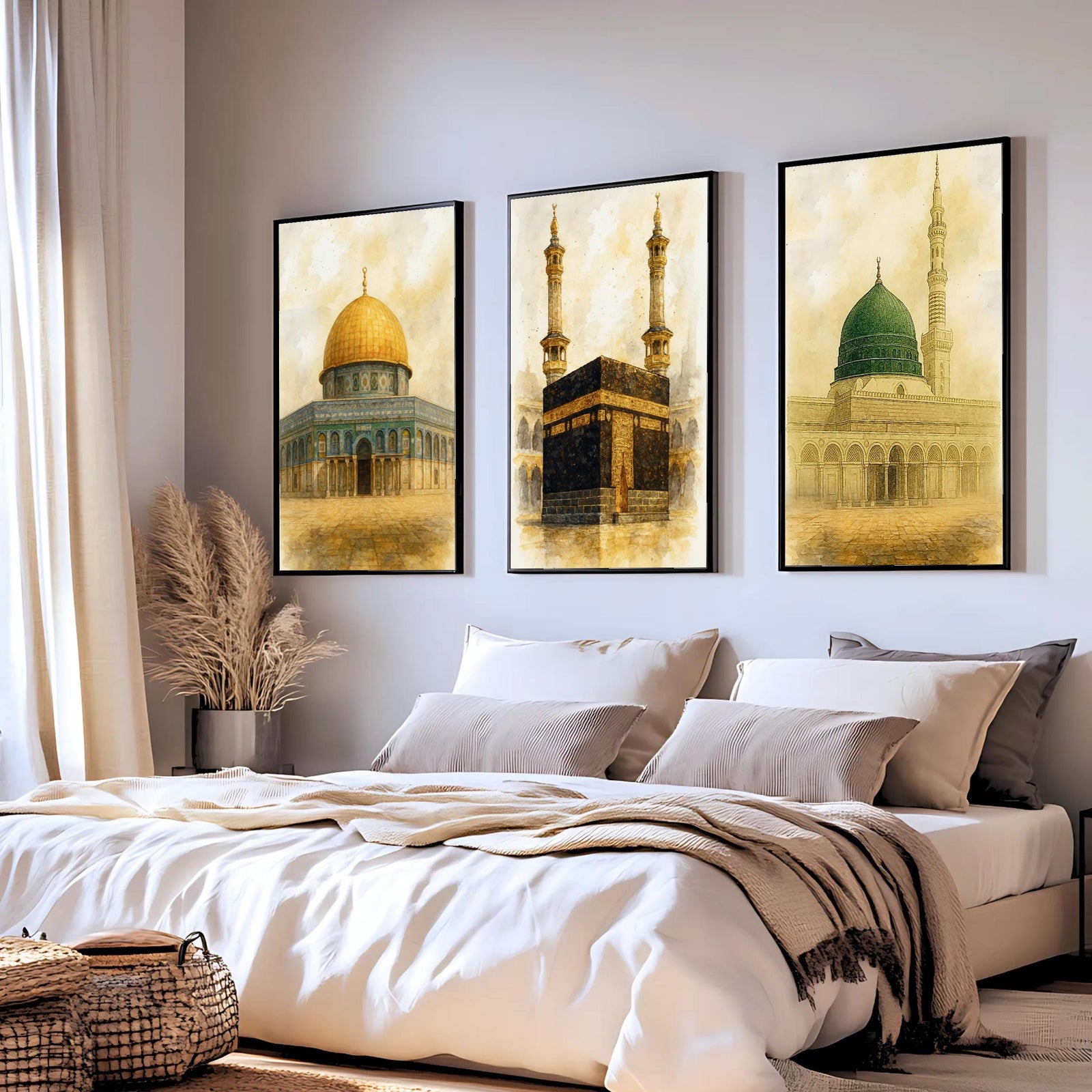 Set of 3 framed canvas triptych depicting the Dome of the Rock, the Kaaba and Al-Masjid An-Nabawi in a soft antique sepia and gold manuscript style, displayed above a neutral sofa in a modern living room.