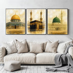 Set of 3 framed canvas triptych depicting the Dome of the Rock, the Kaaba and Al-Masjid An-Nabawi in a soft antique sepia and gold manuscript style, displayed above a neutral sofa in a modern living room.