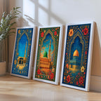 Set of 3 framed canvas triptych showing the Dome of the Rock, Al-Masjid An-Nabawi and Masjid Al-Haram inside ornate floral Islamic arches in rich blue and gold tones, displayed above a neutral sofa.