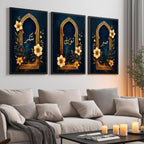 Set of 3 framed canvas triptych with Sabr, Shukr and Tawakkul in gold Arabic calligraphy inside ornate navy and gold Islamic arches surrounded by yellow and dark blue flowers, displayed above a grey sofa.