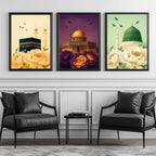 Set of 3 framed canvas triptych showing the Kaaba, Dome of the Rock and Al-Masjid An-Nabawi with oversized peony flowers and birds in flight, each panel on a distinct yellow, purple and green background.