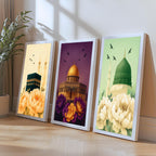 Set of 3 framed canvas triptych showing the Kaaba, Dome of the Rock and Al-Masjid An-Nabawi with oversized peony flowers and birds in flight, each panel on a distinct yellow, purple and green background.