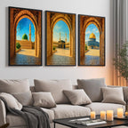 Set of 3 framed canvas triptych showing Al-Masjid An-Nabawi, the Kaaba and the Dome of the Rock viewed through realistic rustic sandstone arches with cobblestone courtyards under a bright blue sky, displayed above a neutral sofa.