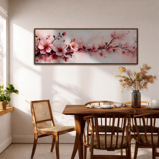 Panoramic painting of a cherry blossom branch stretching across the composition with soft pink sakura flowers and delicate buds blooming along dark slender branches. The artwork features watercolor inspired brushwork and gentle gradients of blush pink and white against a light background, forming a tranquil horizontal floral composition.