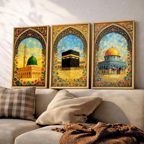 Set of 3 framed canvas triptych depicting Al-Masjid An-Nabawi, the Kaaba and the Dome of the Rock in warm golden mosaic style with vibrant floral arch borders, displayed above a neutral sofa.
