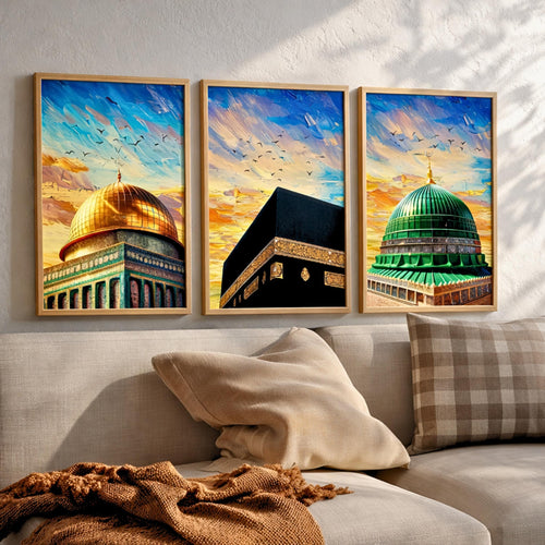 Set of 3 framed canvas triptych showing close-up domes of the Dome of the Rock, Kaaba and Al-Masjid An-Nabawi in bold impressionist brushstrokes with vibrant blue and golden skies and birds in flight.