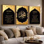 Set of 3 framed canvas triptych featuring Surah Al-Maoun, Muhammad in Arabic calligraphy and Surah Al-Fatiha in gold on dramatic black arch panels with gold textured background, displayed above a neutral sofa.