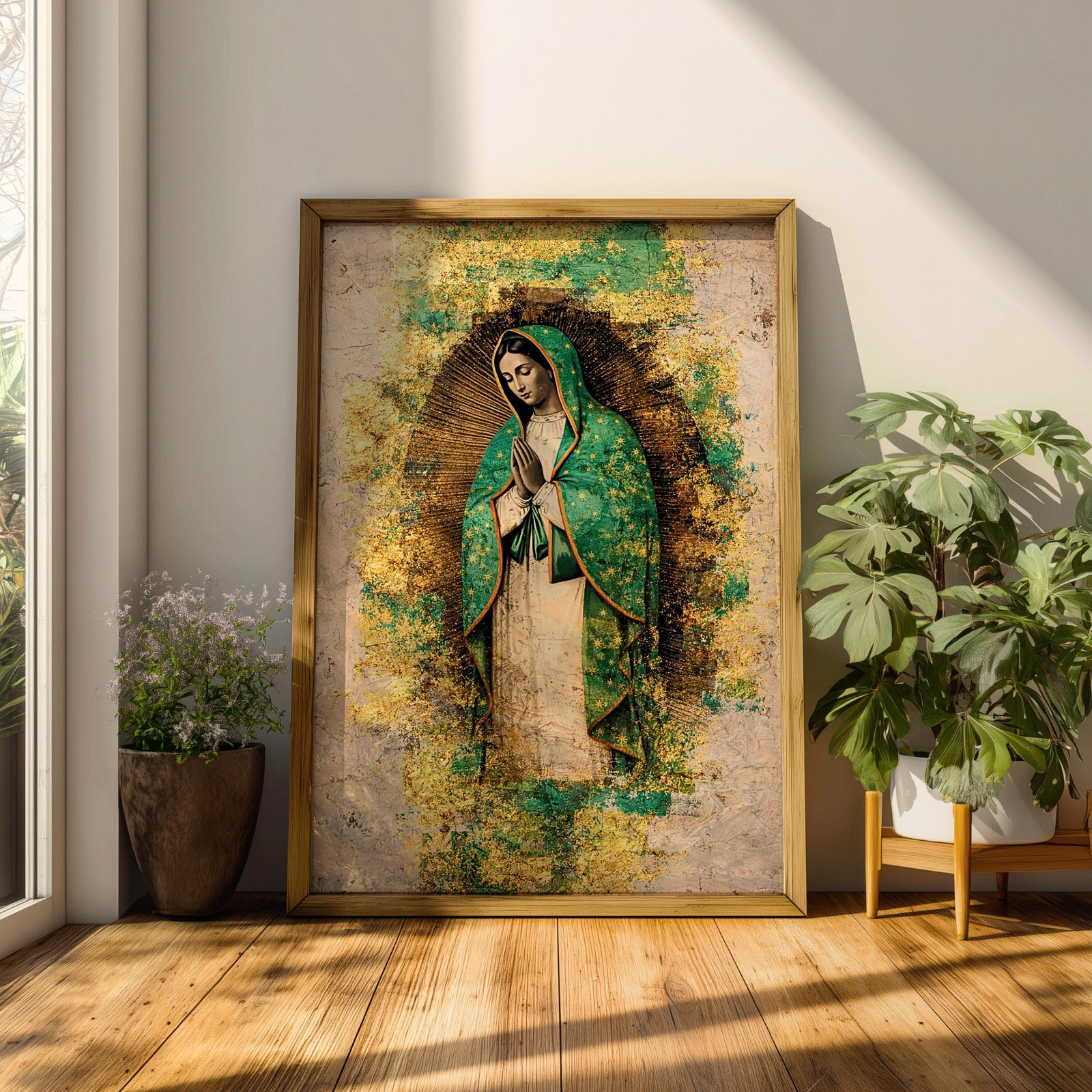 A textured religious artwork of Our Lady of Guadalupe depicted with hands in prayer, wearing a green star-covered mantle and surrounded by a radiant golden aura, set against a distressed abstract background with layered gold and earthy tones that enhance the sacred and iconic composition.