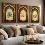 Set of 3 framed canvas triptych featuring Allah, Bismillah and Muhammad in Arabic calligraphy inside ornate gold Islamic arches on rich blue, purple and green jewel tone backgrounds, displayed above a neutral sofa.