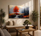 A framed impasto oil painting depicting an autumn landscape featuring a vibrant fall tree with bright orange leaves, a flowing waterfall over rocks, and tall pine trees in the background, rendered with textured brushstrokes emphasizing natural elements and seasonal beauty.