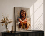 A watercolor-style portrait of the Sacred Heart of Jesus showing a bearded man with long hair, hands extended forward, palms up, rendered with soft brush strokes and warm tones blending into a light background.