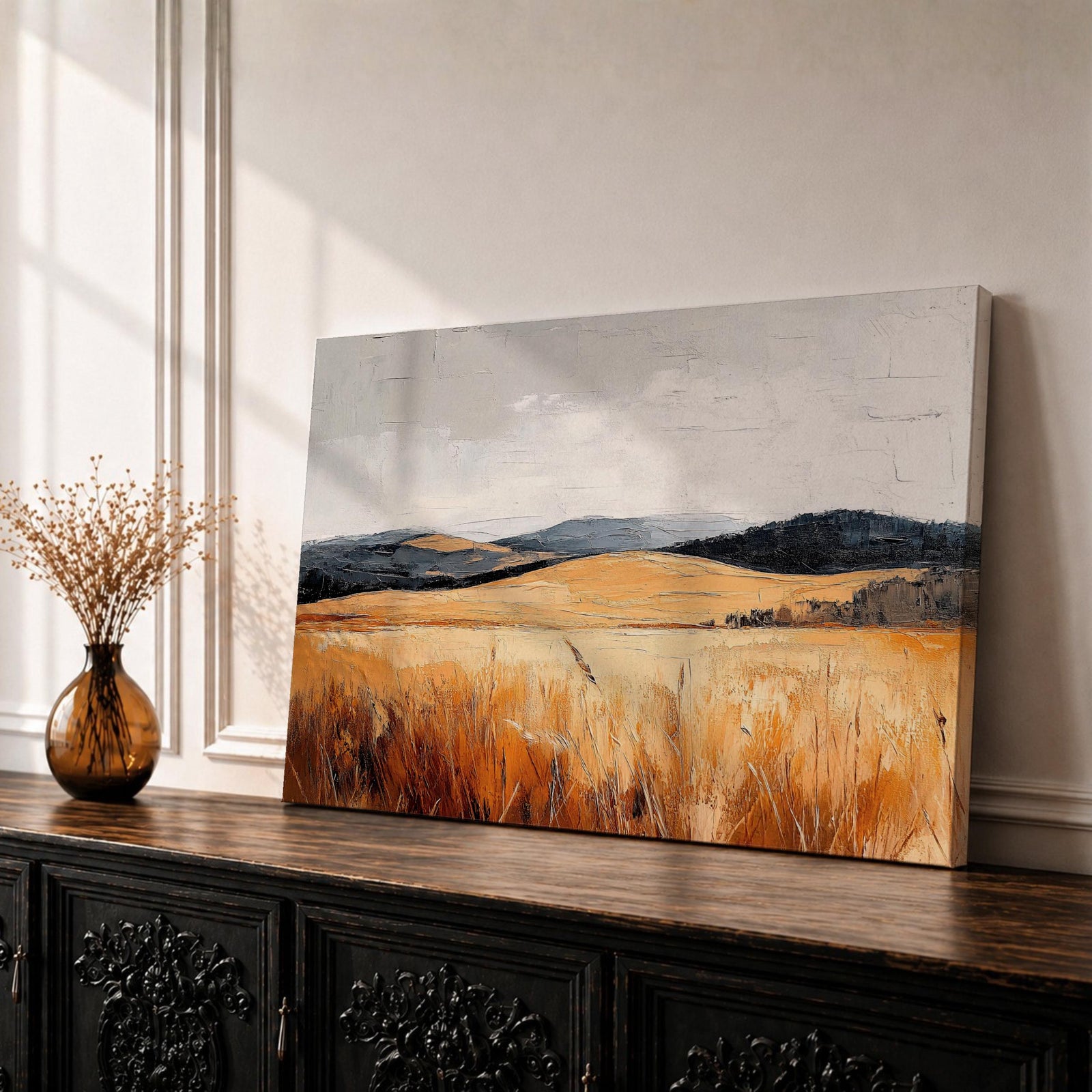 A vintage-style framed canvas painting depicting a vast landscape of golden fields and rolling hills under a muted sky. The textured brushstrokes emphasize the natural prairie scene with tall grasses in the foreground and distant hills, capturing a serene rural environment.