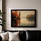 An oil painting of a serene autumn lake scene featuring calm water reflecting trees with vibrant fall foliage in shades of red and orange. The vintage style artwork captures a peaceful lakeside landscape with detailed trees on both sides and a soft, muted sky in the background.