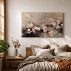 An abstract framed canvas artwork depicting cherry blossom flowers in soft, blurred tones with textured brush strokes creating a delicate floral composition that evokes the beauty of spring blooms in a modern artistic style.