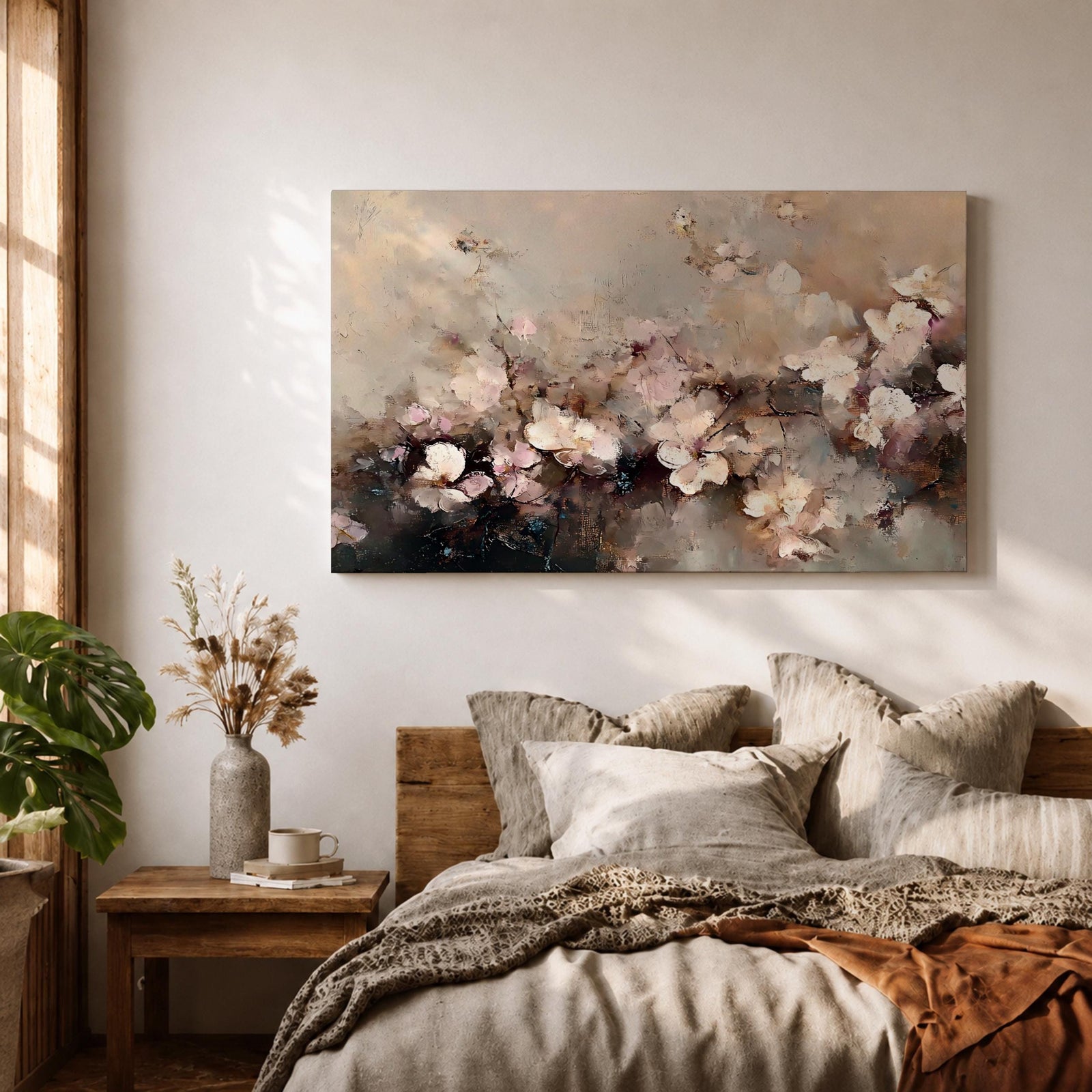 An abstract framed canvas artwork depicting cherry blossom flowers in soft, blurred tones with textured brush strokes creating a delicate floral composition that evokes the beauty of spring blooms in a modern artistic style.