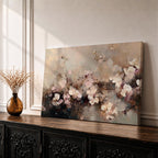 An abstract framed canvas artwork depicting cherry blossom flowers in soft, blurred tones with textured brush strokes creating a delicate floral composition that evokes the beauty of spring blooms in a modern artistic style.