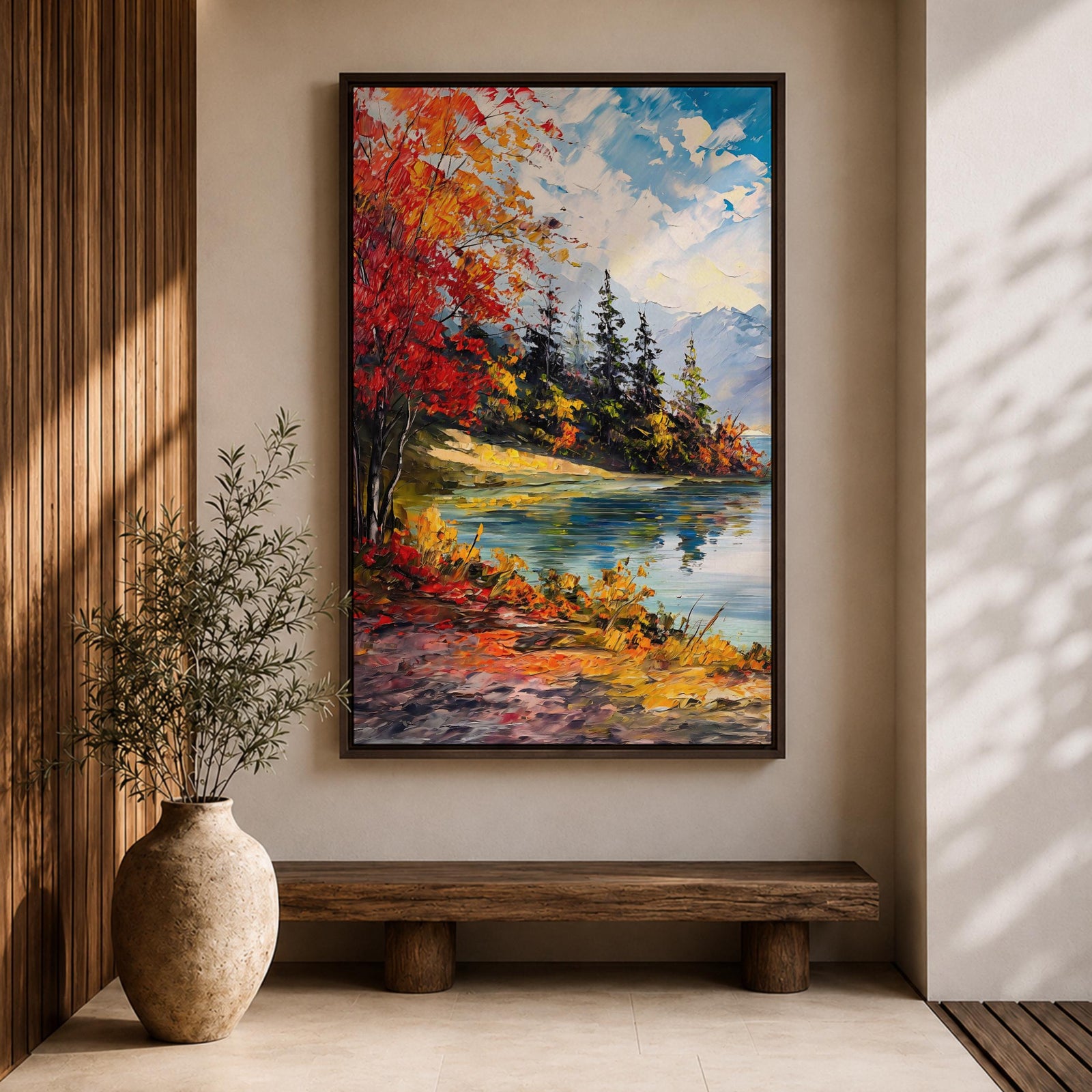 A vibrant impasto painting depicting an autumn lake scene with colorful red and orange foliage on the shore, evergreen trees, and distant mountains under a partly cloudy blue sky, rendered with thick textured brushstrokes creating a rich, dynamic landscape composition.