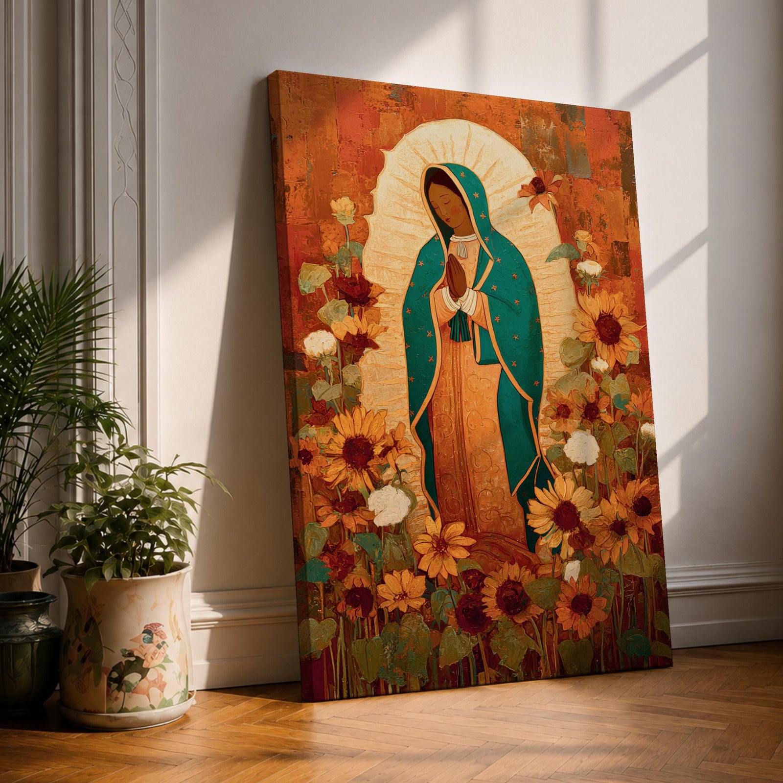 This artwork depicts Our Lady of Guadalupe, also known as the Virgin of Guadalupe, surrounded by vibrant sunflowers and floral elements in a vintage style. The figure is shown with hands clasped in prayer, wearing a teal mantle adorned with stars, set against a warm textured background.