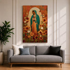 This artwork depicts Our Lady of Guadalupe, also known as the Virgin of Guadalupe, surrounded by vibrant sunflowers and floral elements in a vintage style. The figure is shown with hands clasped in prayer, wearing a teal mantle adorned with stars, set against a warm textured background.