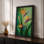 A vibrant painting of Bird of Paradise flowers (Strelitzia) featuring bold orange and purple petals with lush green leaves on a textured green background. The floral composition is realistic with a tropical theme, capturing the exotic beauty of these iconic flowers in a framed canvas style.