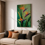A vibrant painting of Bird of Paradise flowers (Strelitzia) featuring bold orange and purple petals with lush green leaves on a textured green background. The floral composition is realistic with a tropical theme, capturing the exotic beauty of these iconic flowers in a framed canvas style.