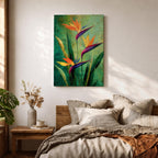 A vibrant painting of Bird of Paradise flowers (Strelitzia) featuring bold orange and purple petals with lush green leaves on a textured green background. The floral composition is realistic with a tropical theme, capturing the exotic beauty of these iconic flowers in a framed canvas style.
