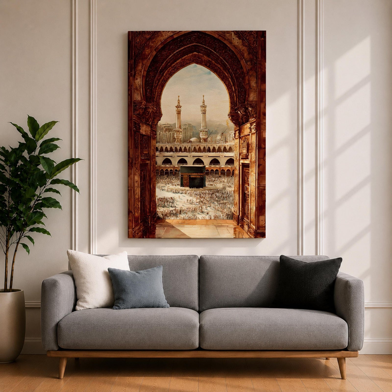 Artwork showing the Kaaba in Mecca viewed through an ornate Islamic archway with intricate carved stone details, overlooking the Masjid al Haram courtyard filled with pilgrims and surrounded by minarets and mosque architecture under warm sunlight.