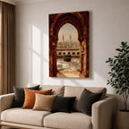 Artwork showing the Kaaba in Mecca viewed through an ornate Islamic archway with intricate carved stone details, overlooking the Masjid al Haram courtyard filled with pilgrims and surrounded by minarets and mosque architecture under warm sunlight.