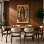 A framed stitched style art print depicting Our Lady of Guadalupe with hands clasped in prayer, surrounded by a radiant golden halo and vibrant floral embroidery in red, blue, and green. The image captures the traditional Mexican Catholic iconography with intricate textile detail and a serene expression.