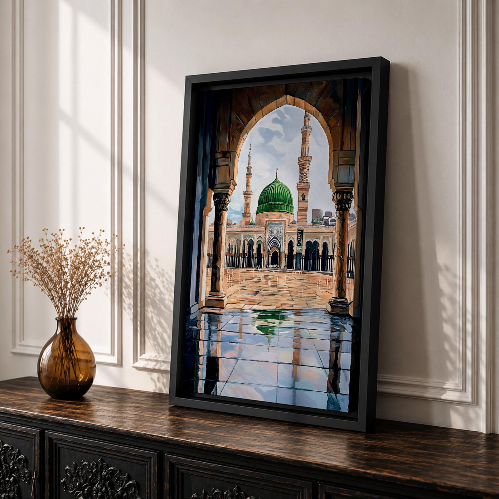Artwork showing the courtyard of Al-Masjid an-Nabawi viewed through a carved Islamic arch, featuring the iconic green dome of the Prophet’s Mosque with tall minarets, reflective marble floor, and bright sky above the sacred mosque complex in Medina.