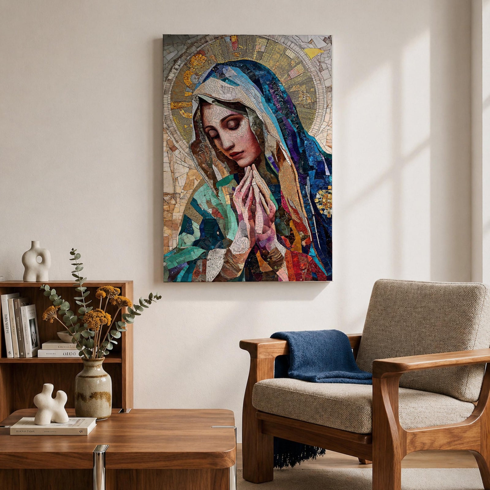 A mosaic-style artwork depicting Virgin Mary with hands clasped in prayer and eyes closed, wearing a blue and white veil with a golden halo behind her head. The piece uses intricate tile fragments to create a stained glass effect, emphasizing religious Christian themes with detailed textures and vibrant colors.