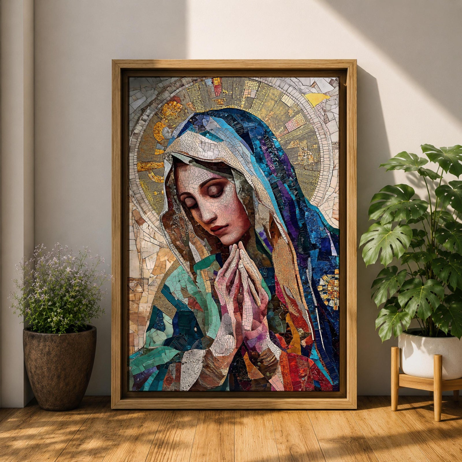 A mosaic-style artwork depicting Virgin Mary with hands clasped in prayer and eyes closed, wearing a blue and white veil with a golden halo behind her head. The piece uses intricate tile fragments to create a stained glass effect, emphasizing religious Christian themes with detailed textures and vibrant colors.