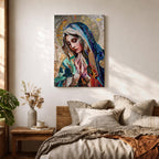 A mosaic-style artwork depicting Virgin Mary with hands clasped in prayer and eyes closed, wearing a blue and white veil with a golden halo behind her head. The piece uses intricate tile fragments to create a stained glass effect, emphasizing religious Christian themes with detailed textures and vibrant colors.