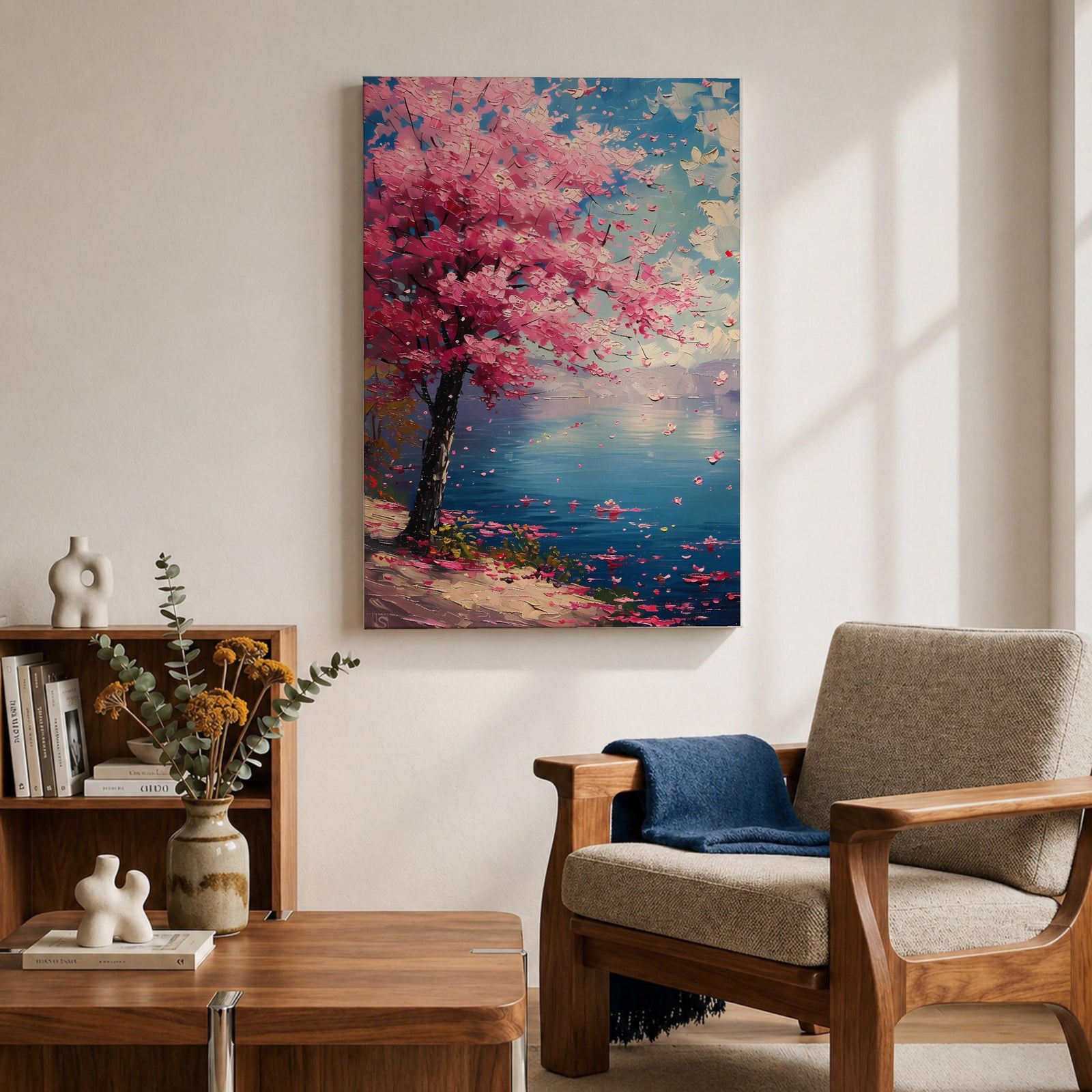 This impasto style painting depicts a cherry blossom tree with vibrant pink flowers beside a calm blue lake under a bright sky. The textured brushstrokes create a vivid floral landscape scene emphasizing the Japanese sakura tree in a natural setting.