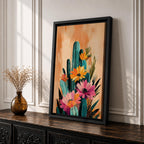 A vibrant watercolor painting featuring a cluster of cacti adorned with large blooming flowers in a boho style. The composition highlights desert flora with detailed brushwork and soft washes of color, creating a fresh and natural floral artwork perfect for botanical-themed decor.