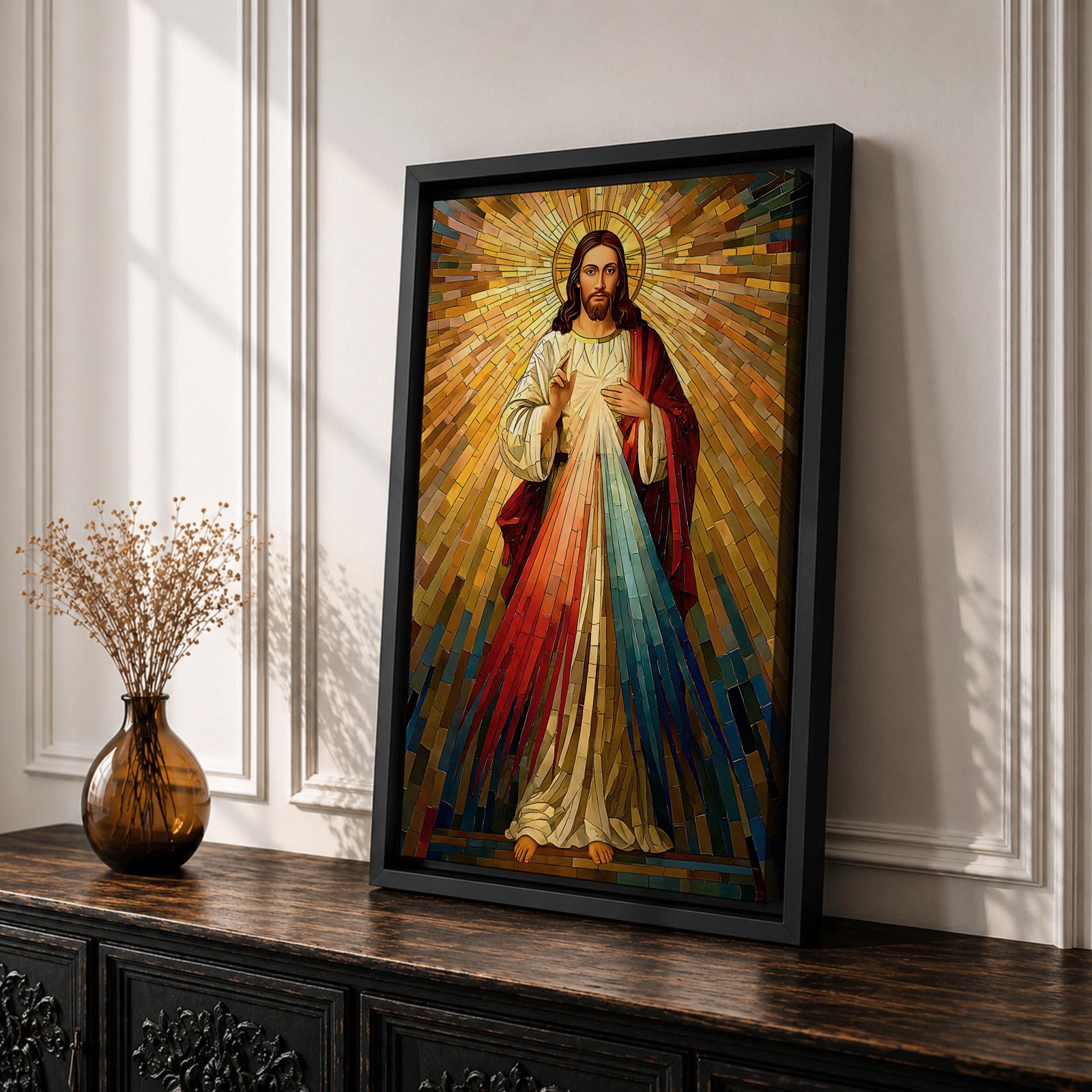 A mosaic style artwork depicting Divine Mercy of Jesus with radiant golden rays emanating behind him and red and blue beams flowing from his heart area, framed in a wooden frame, showcasing intricate tile-like geometric patterns and vibrant colors.