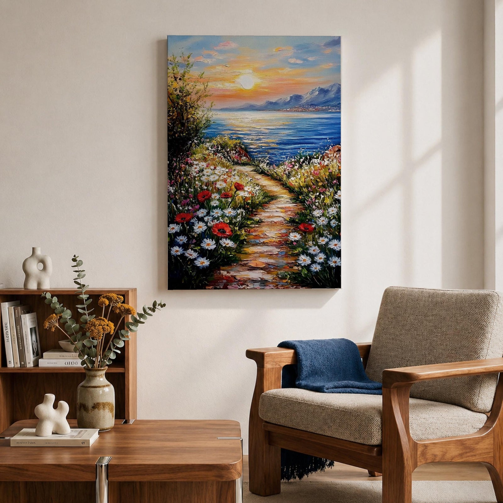 An impasto style framed canvas painting depicting a coastal sunset path bordered by vibrant wildflowers leading to a calm sea with distant mountains under a colorful sky. The textured brush strokes emphasize the natural landscape and seaside atmosphere.