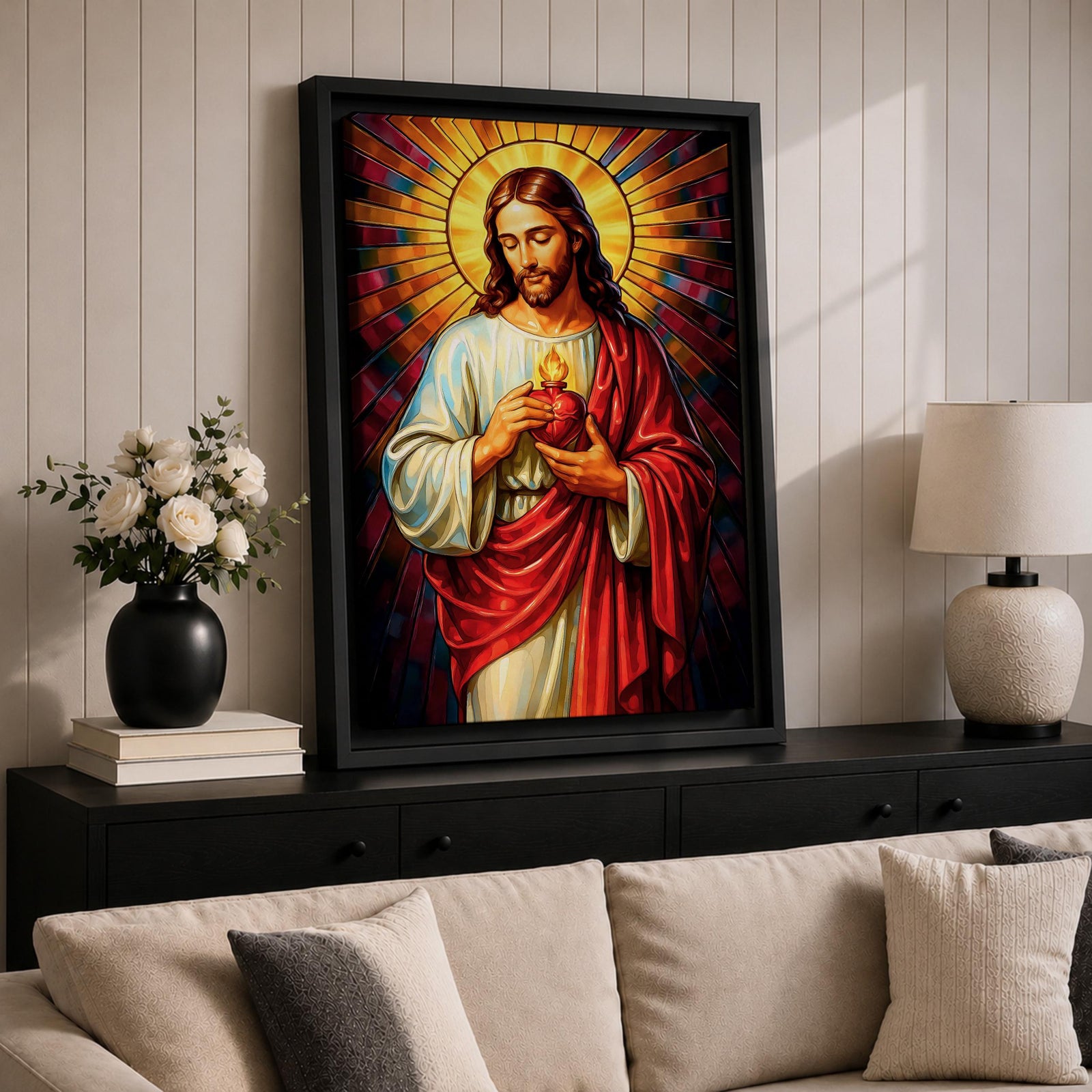A vibrant stained glass style depiction of the Sacred Heart of Jesus featuring Jesus with long hair and beard, holding a flaming heart at his chest, surrounded by radiant colored rays in a mosaic-like pattern, rendered in rich, luminous colors with detailed folds in his robe.
