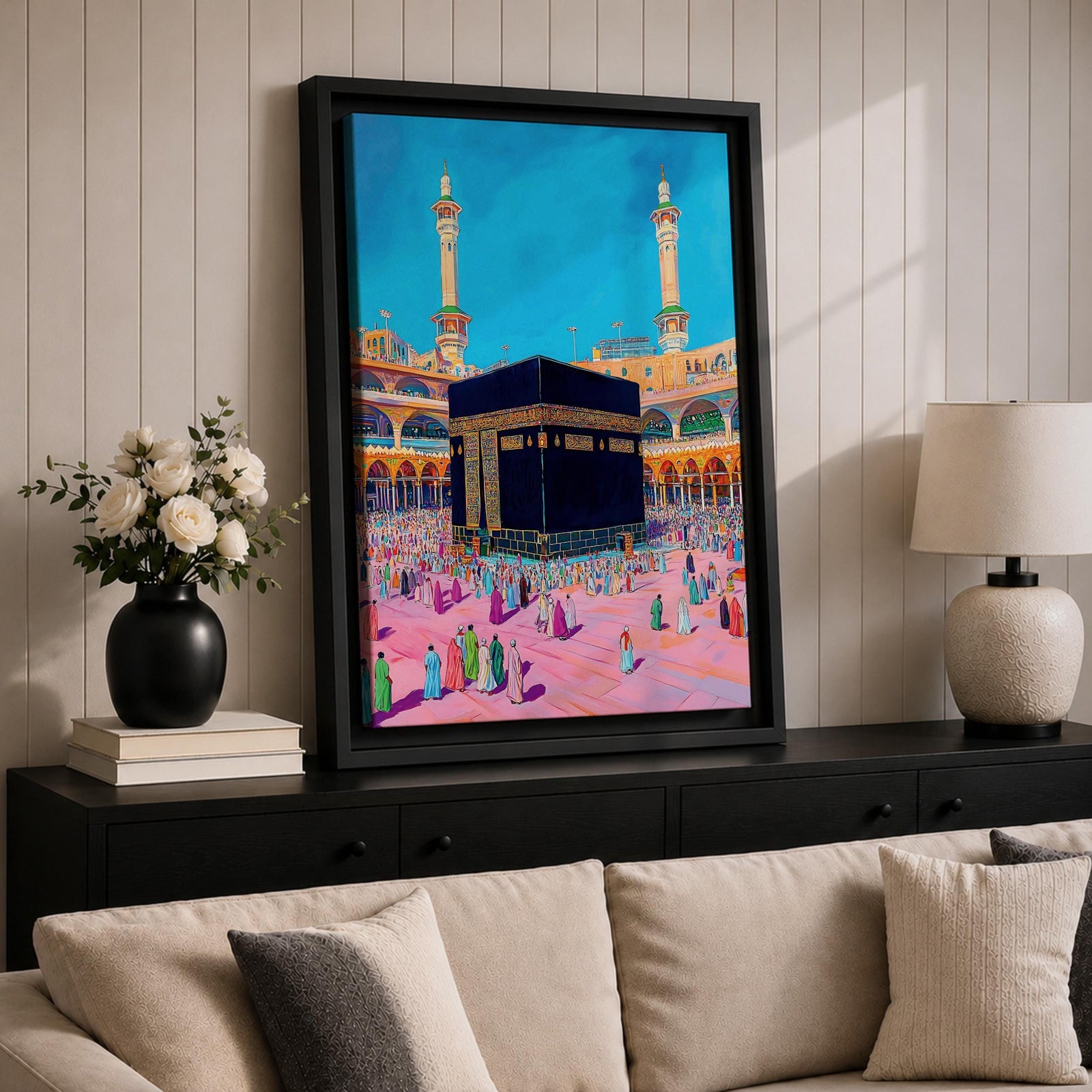 Colorful illustration of the sacred Kaaba at Masjid al-Haram in Mecca surrounded by pilgrims performing tawaf in the mosque courtyard, with two tall minarets rising above the holy mosque under a bright blue sky.