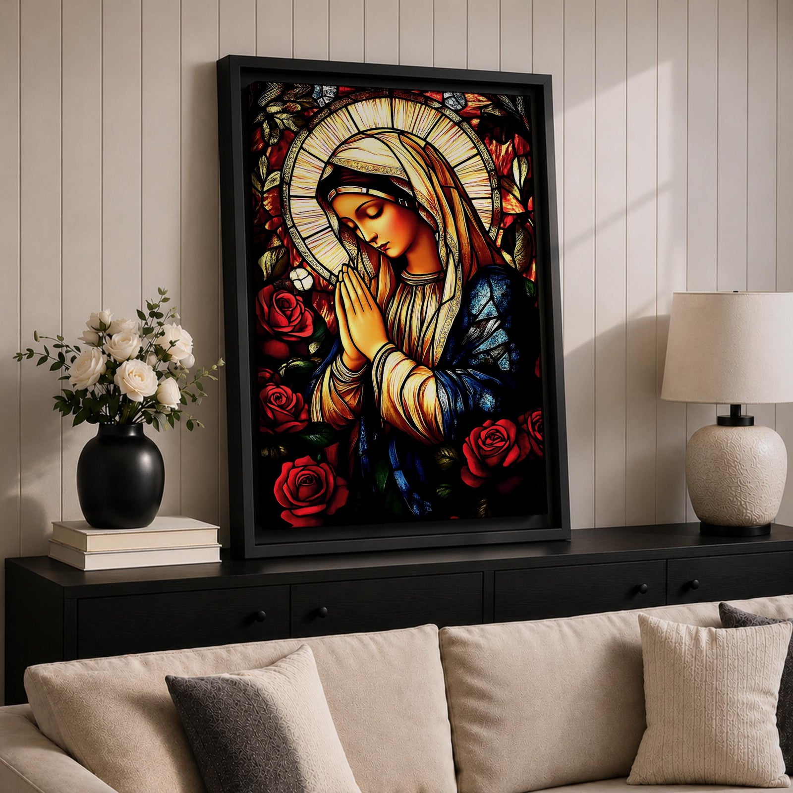 A stained glass style depiction of the Virgin Mary with hands clasped in prayer surrounded by red roses and a radiant halo, rendered in vibrant colors and intricate glass-like textures, evoking a classic religious portrait in a mosaic-inspired visual style.