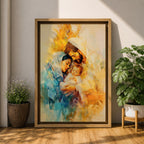 A framed canvas artwork depicting the Holy Family with Mary, Joseph, and baby Jesus in a tender embrace. The painting features warm tones and soft brush strokes, capturing the intimate moment of the Nativity scene with a focus on the figures' expressions and clothing details.